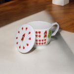 Little Red Riding Hood Porcelain Mug with the lid open and put on it's side