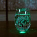 月光冷感杯 櫻花 - single glass with water under the light