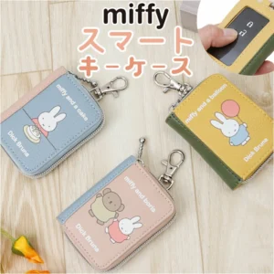 Miffy 書本造型智能鑰匙包 黃色・粉紅色・藍色, 木地板上三色產品展示照
